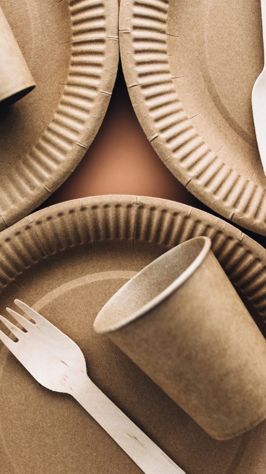 Various eco-friendly kraft paper packaging, fork, cup and plate, containers for takeaway food. Zero waste and recycling concept. High quality photo